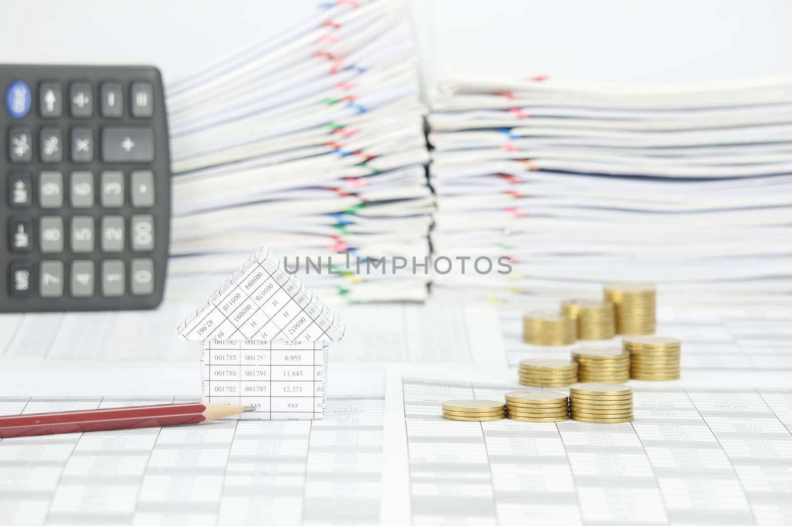 House and brown pencil with step pile of gold coins by eaglesky