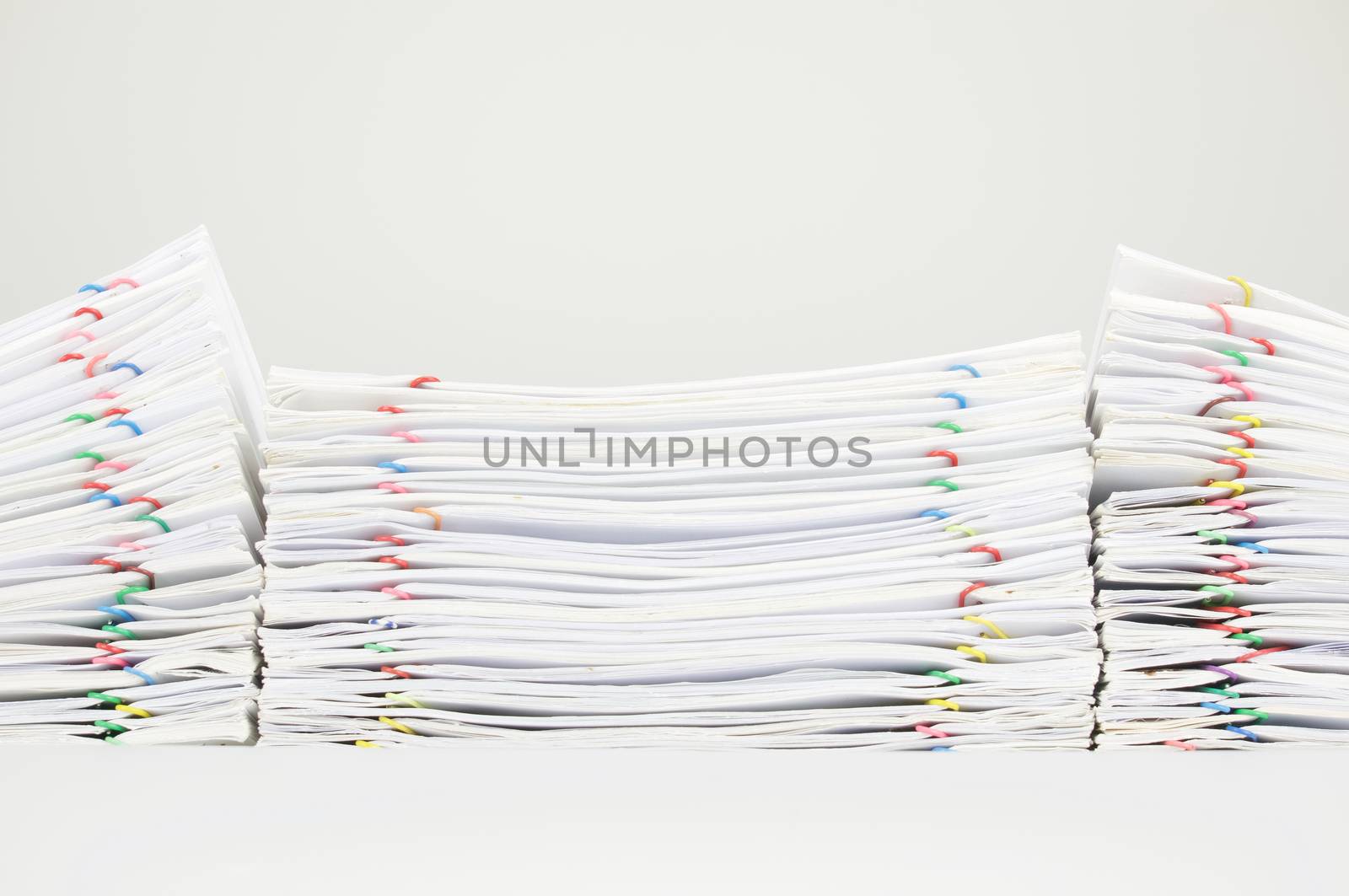 Pile overload document of report and receipt on white background by eaglesky