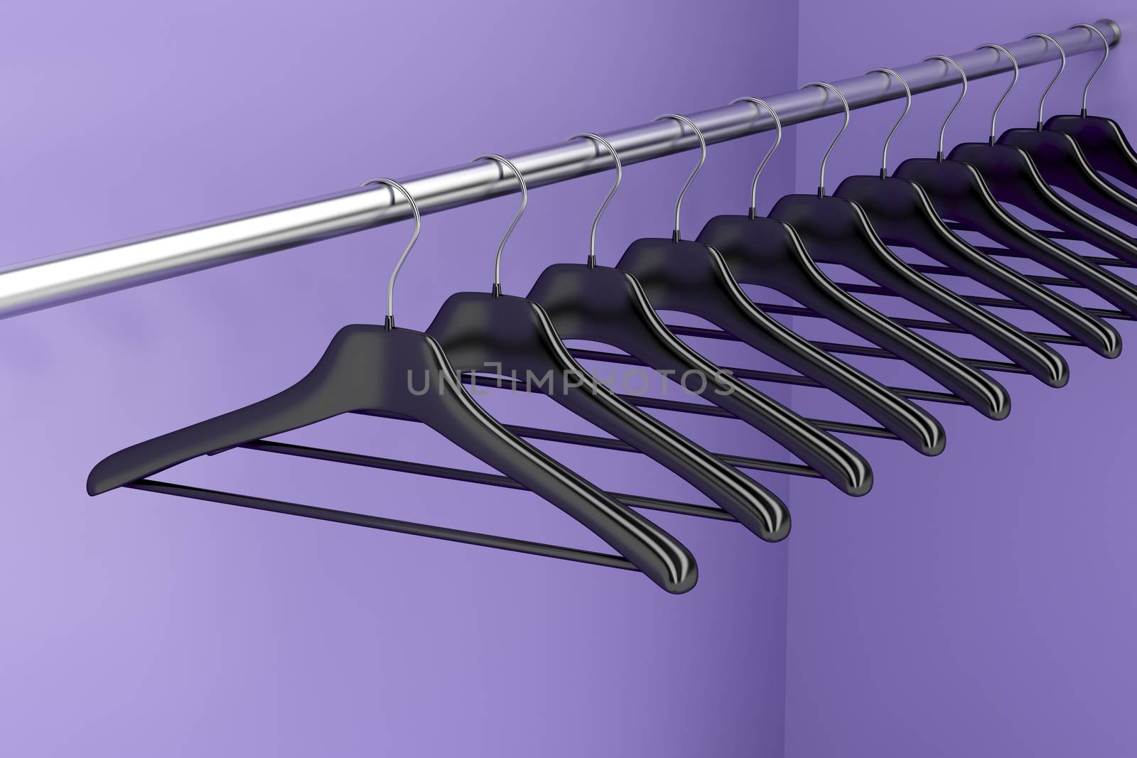 Plastic hangers hanging on rod in the closet
