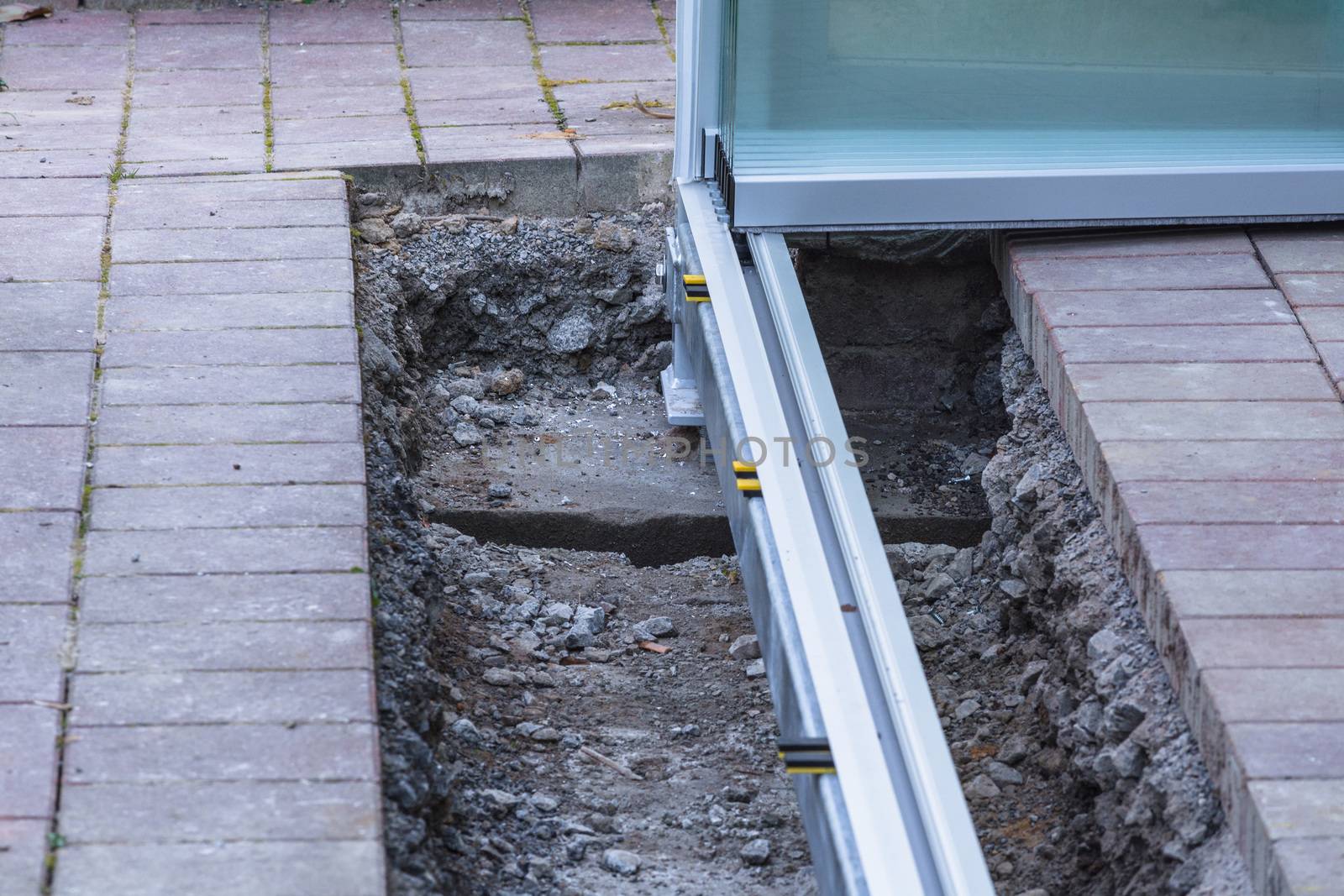 Construction site for a new conservatory, patio roof porch.