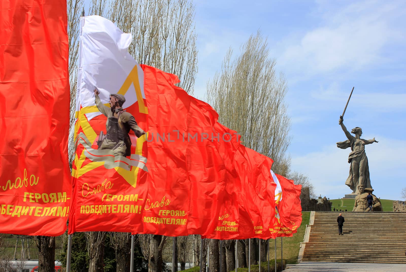 Festive flags with an inscription "Glory to conquering heroes!" on Mamayev Kurgan in Volgograd