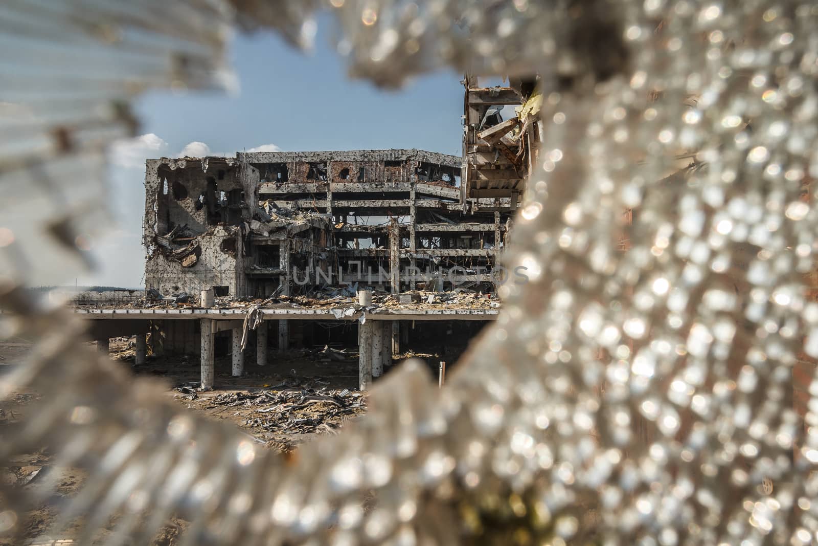 Wide Angle view of donetsk airport ruins through broken glass after massive artillery shelling