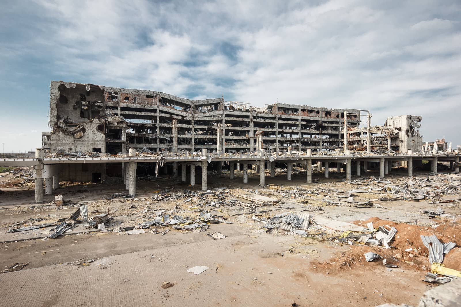 Wide angle view of donetsk airport ruins by mrakor