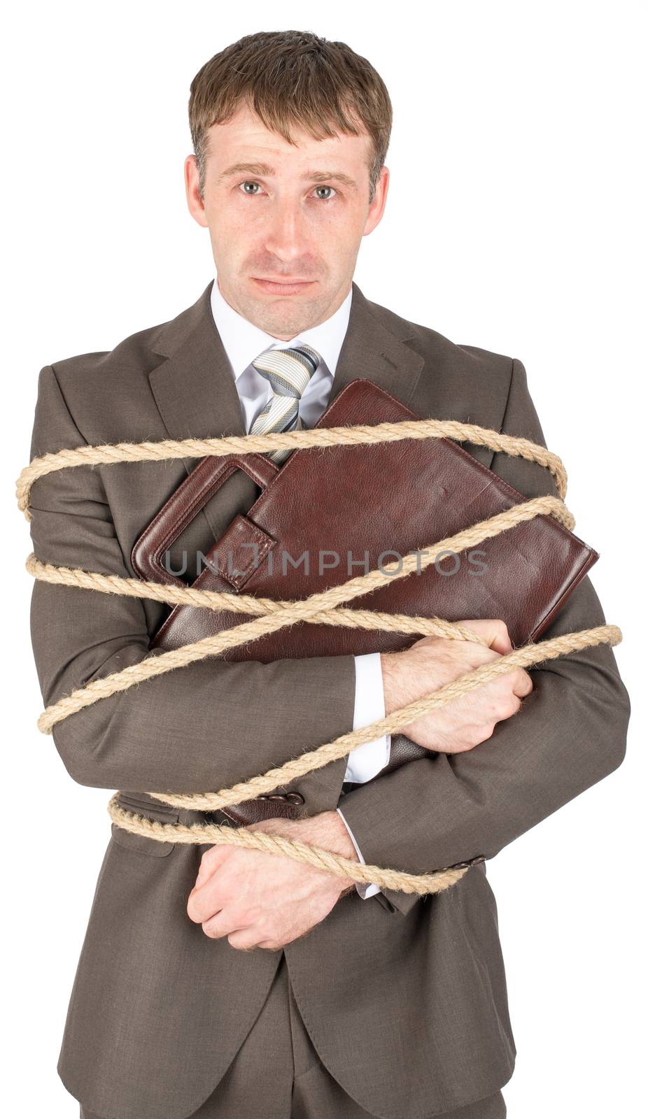 Young businessman tied with ropes by cherezoff