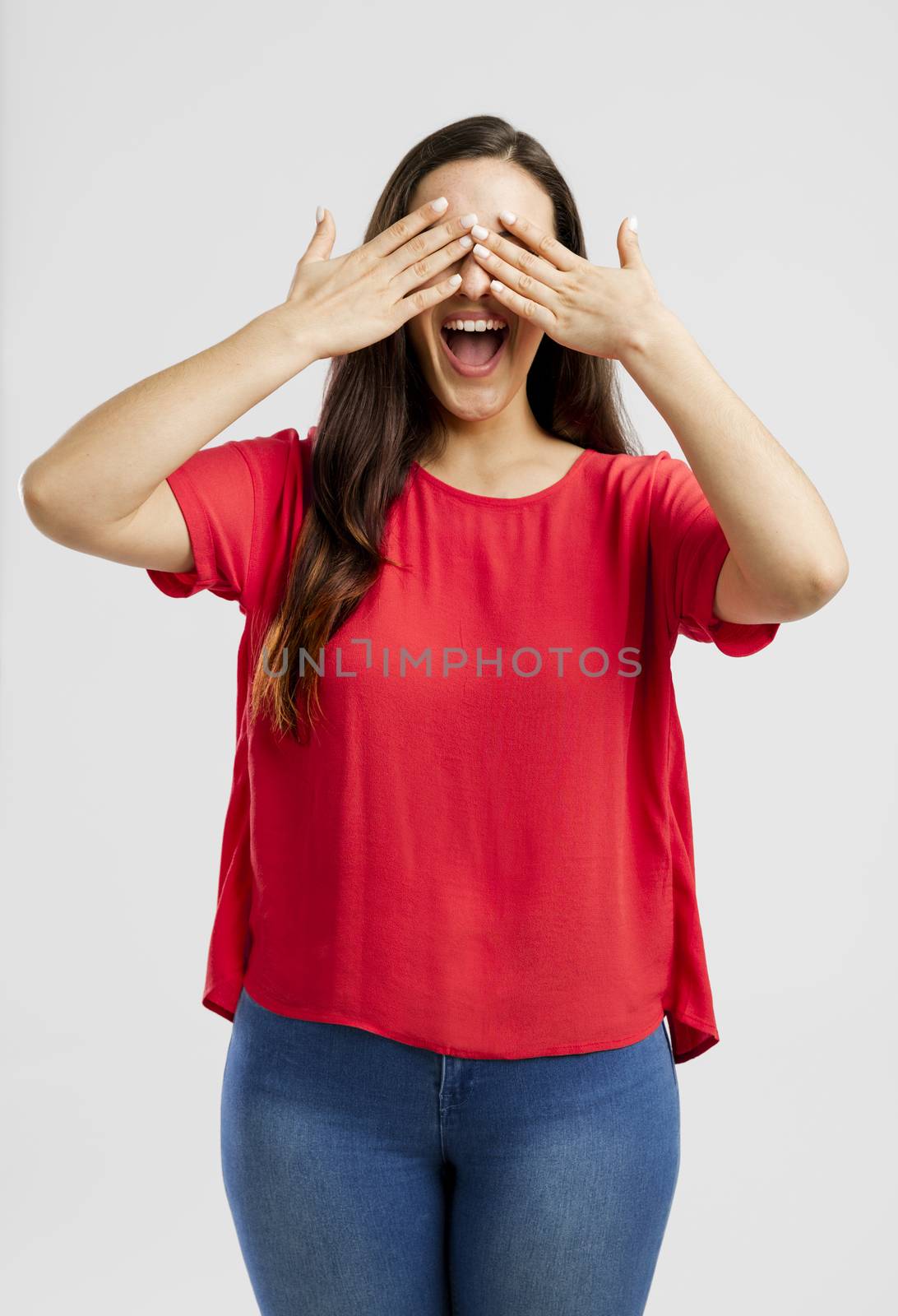 Lovey woman covering her eyes with hands