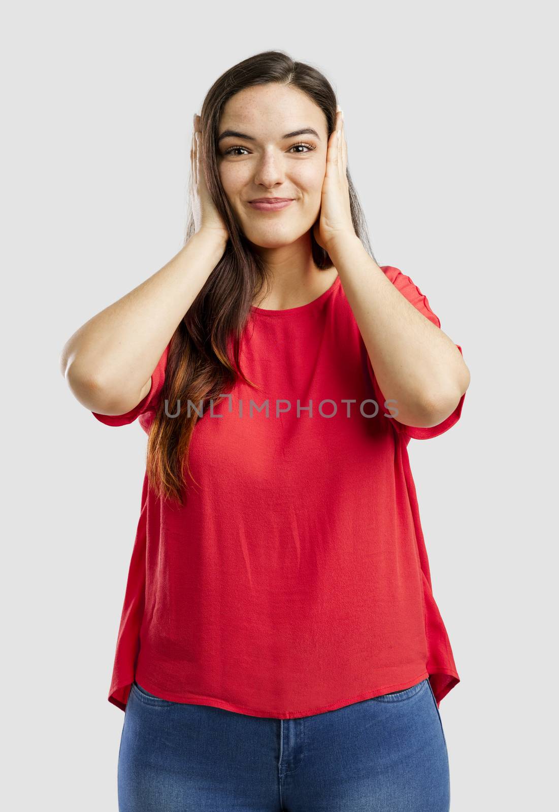 Lovey woman covering her ears with hands