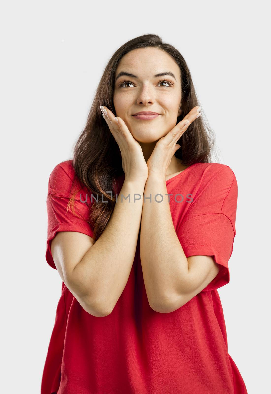 Portrait of a beautiful lovely woman with a dreaming expression