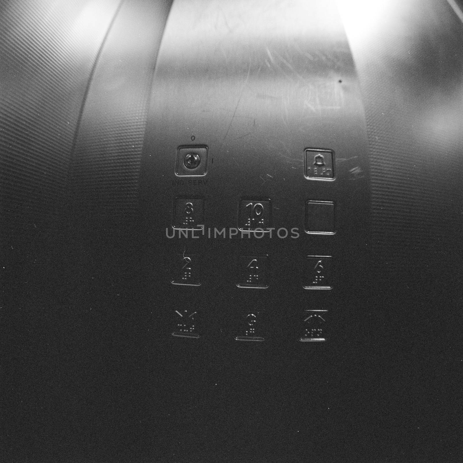 Black and white film image of elevator's key pad