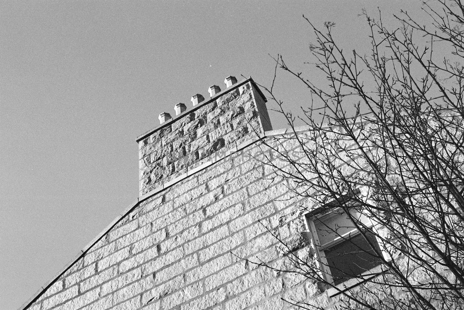 Black and white film photograph of a building in Aberdeen