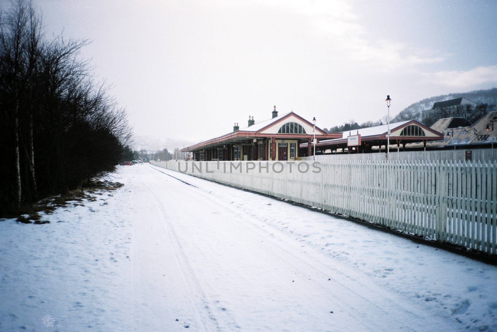 Color film image of train station in Aviemore