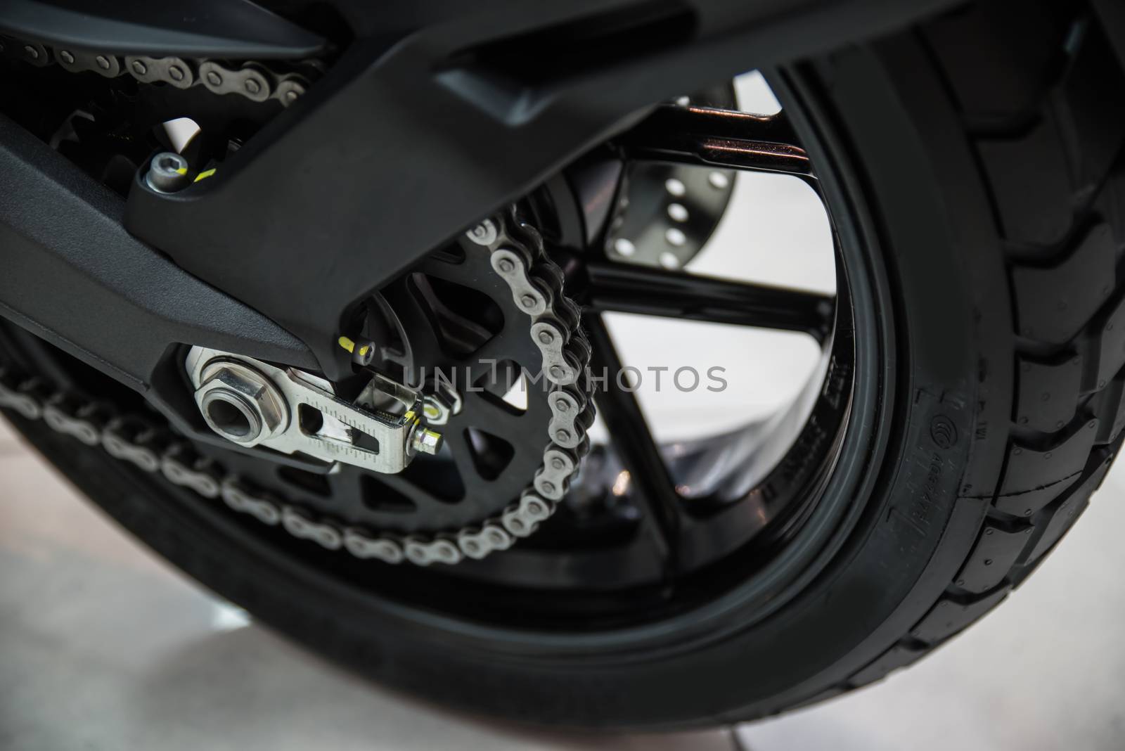 Modern motorcycle drive chain closeup. Shallow dof