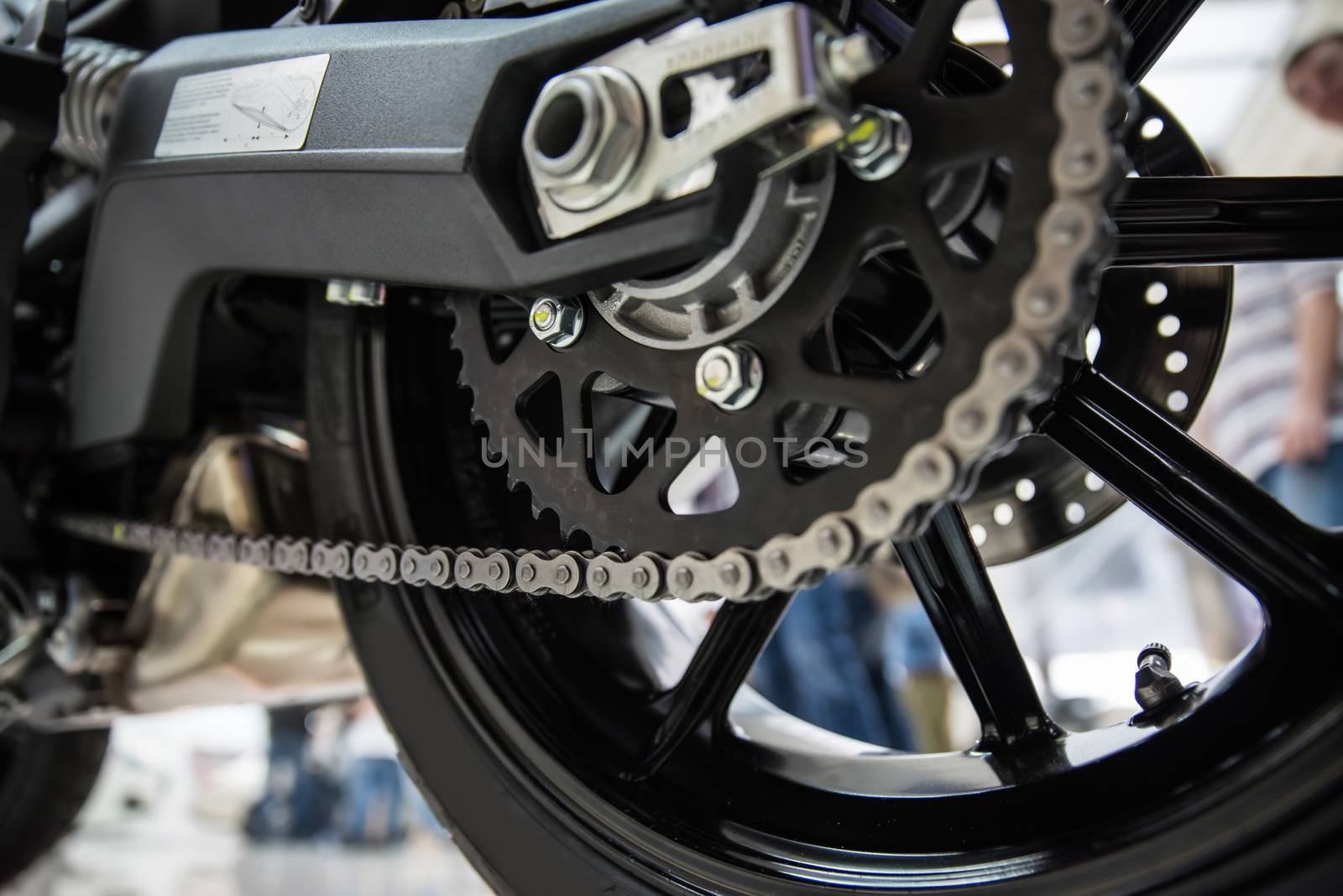 Modern motorcycle drive chain closeup. Shallow dof