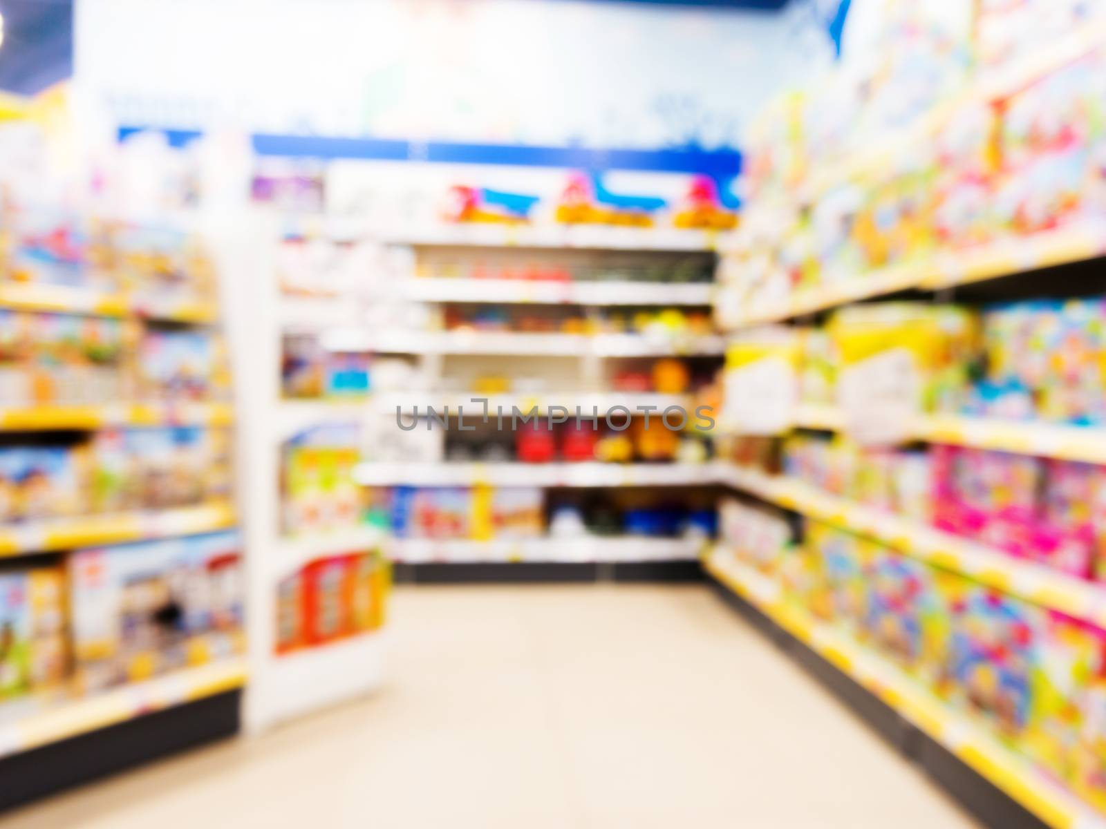 Blurred of kids toy store background by fascinadora