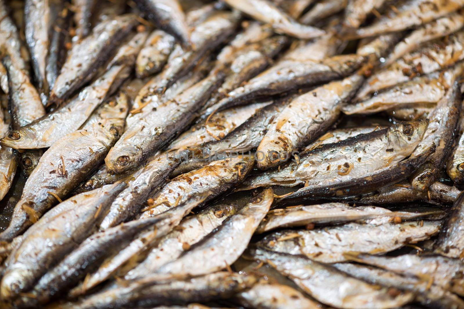 Fresh crispy fried Smelts in the pan. Close-up.