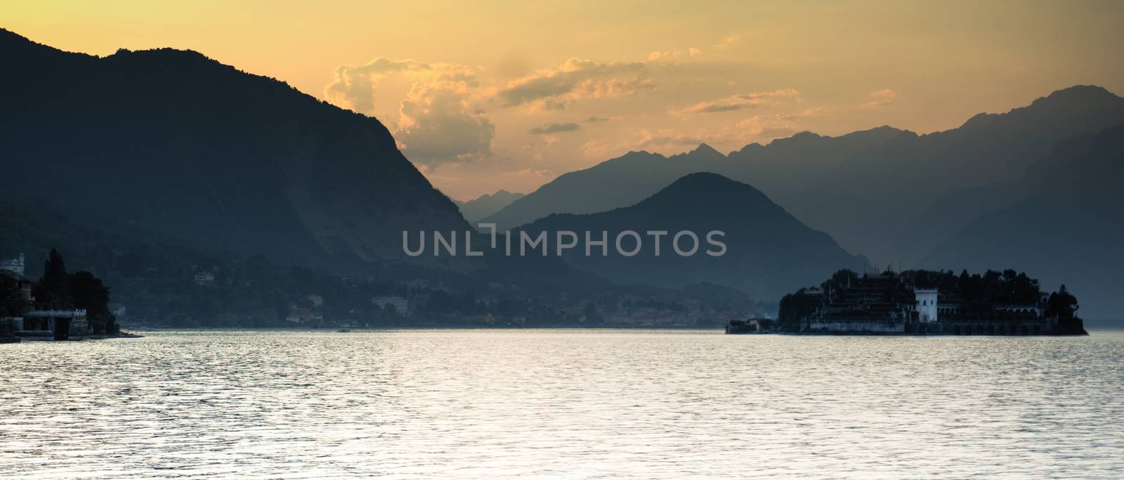 Romantic sunset on a lake in North Italy during summer vacation