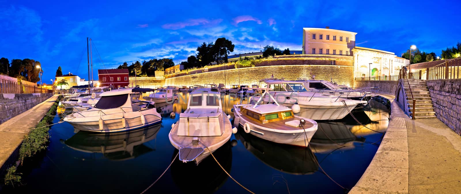 Zadar city walls and Fosa harbor evening panorama, Dalmatia, Croatia