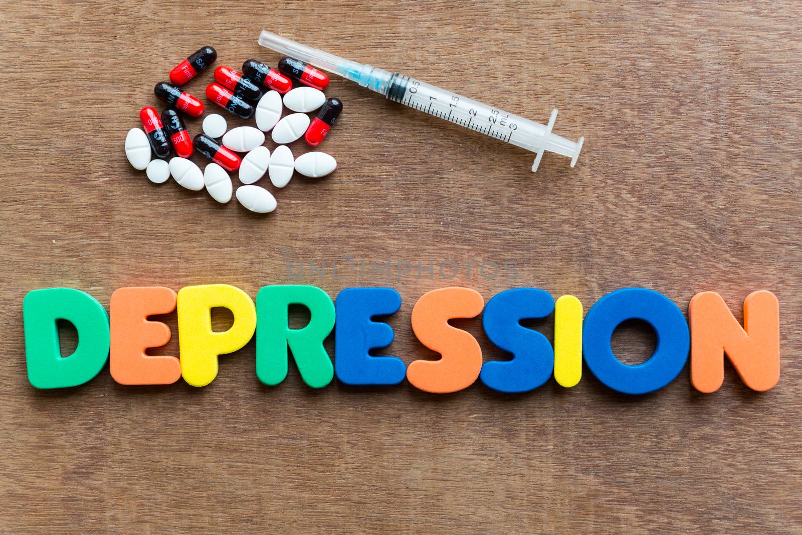 depression colorful word in the wooden background