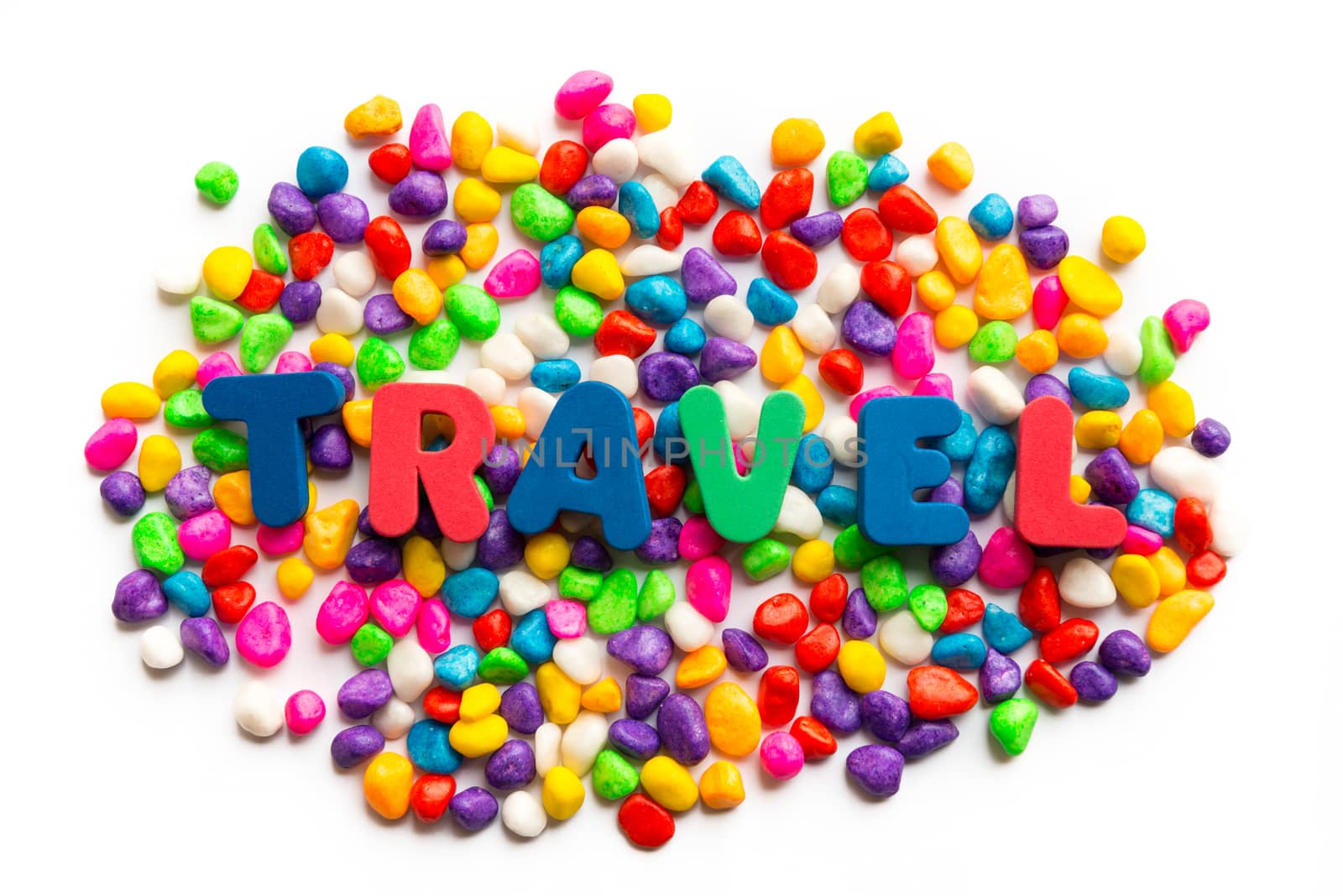 travel word on colorful stone