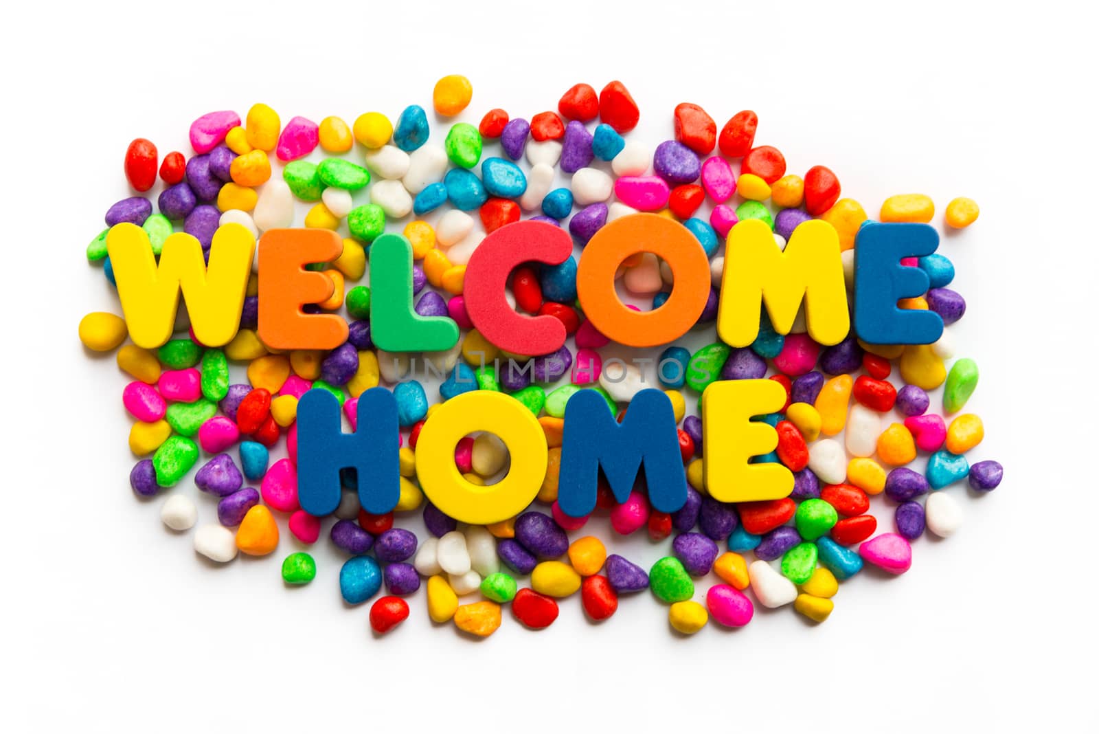 welcome home word in colorful stone