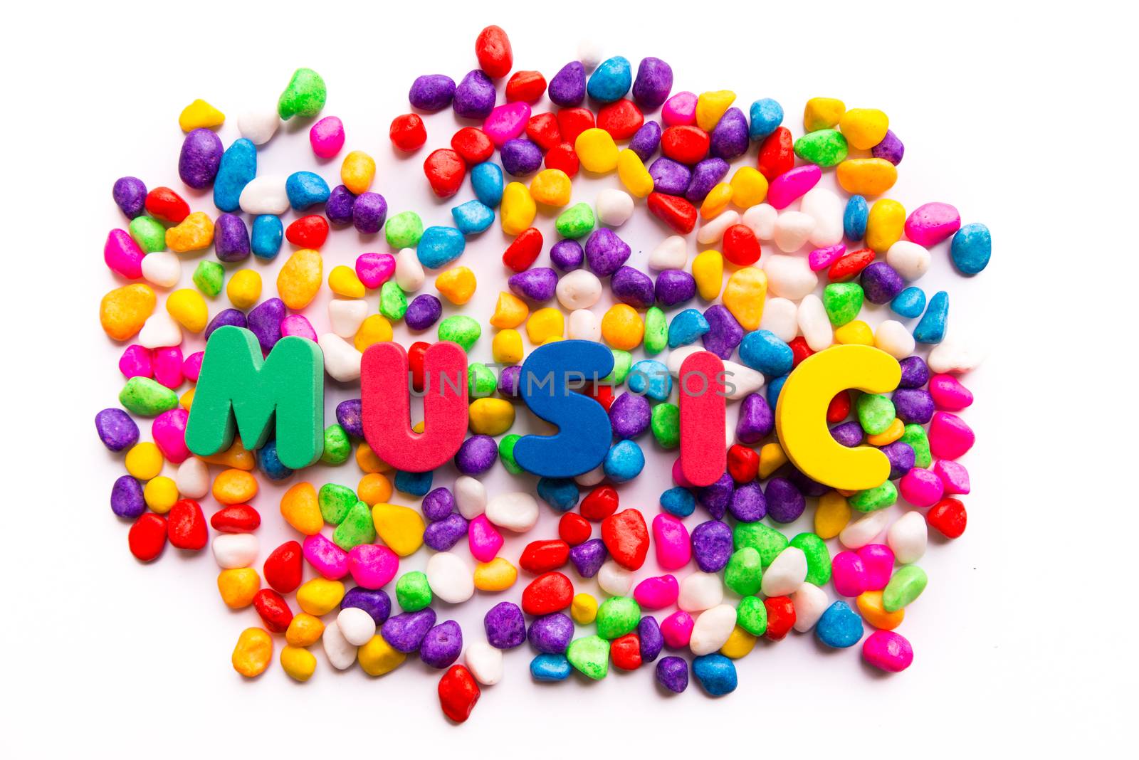 music words in colorful stones