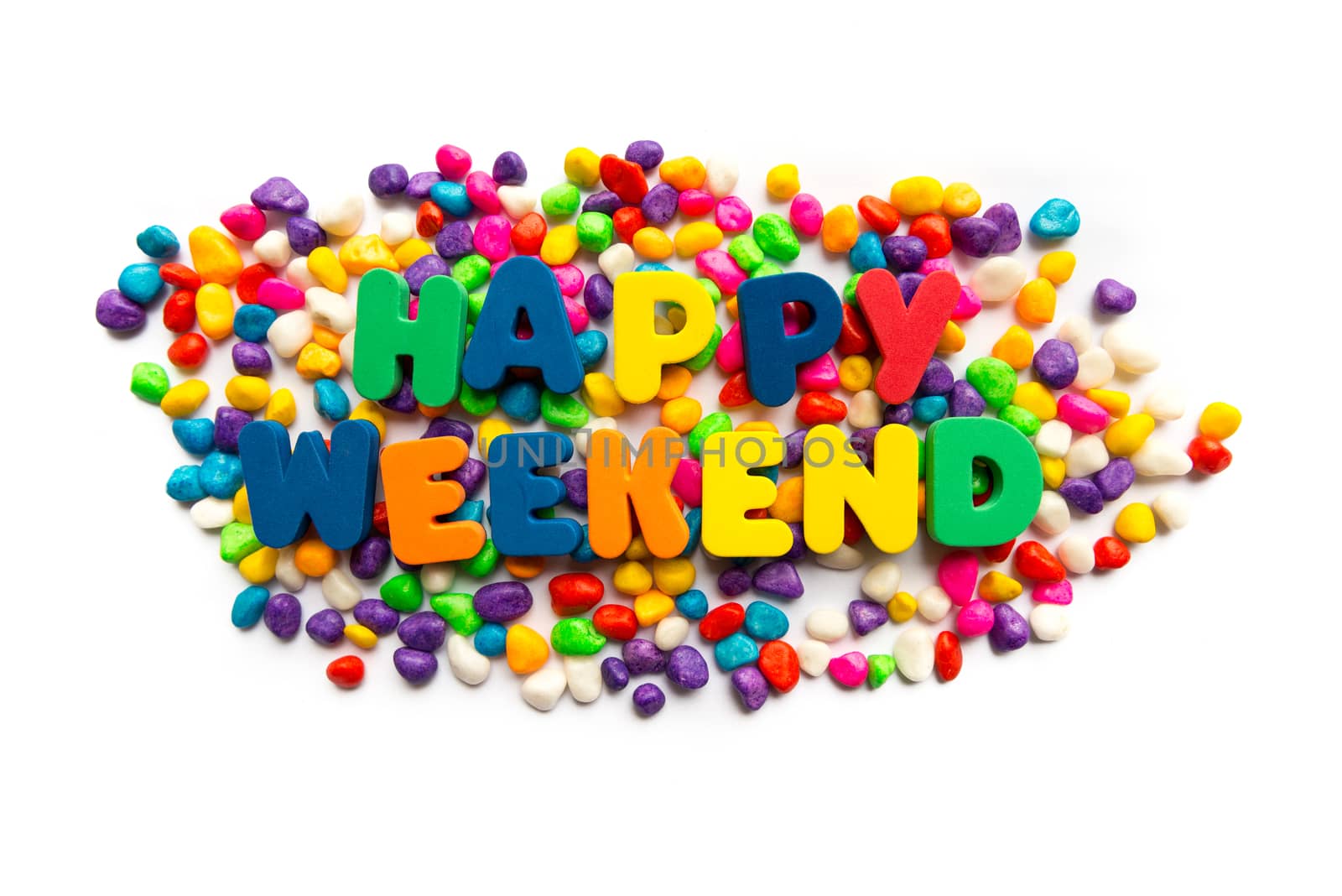 happy weekend words in colorful stones