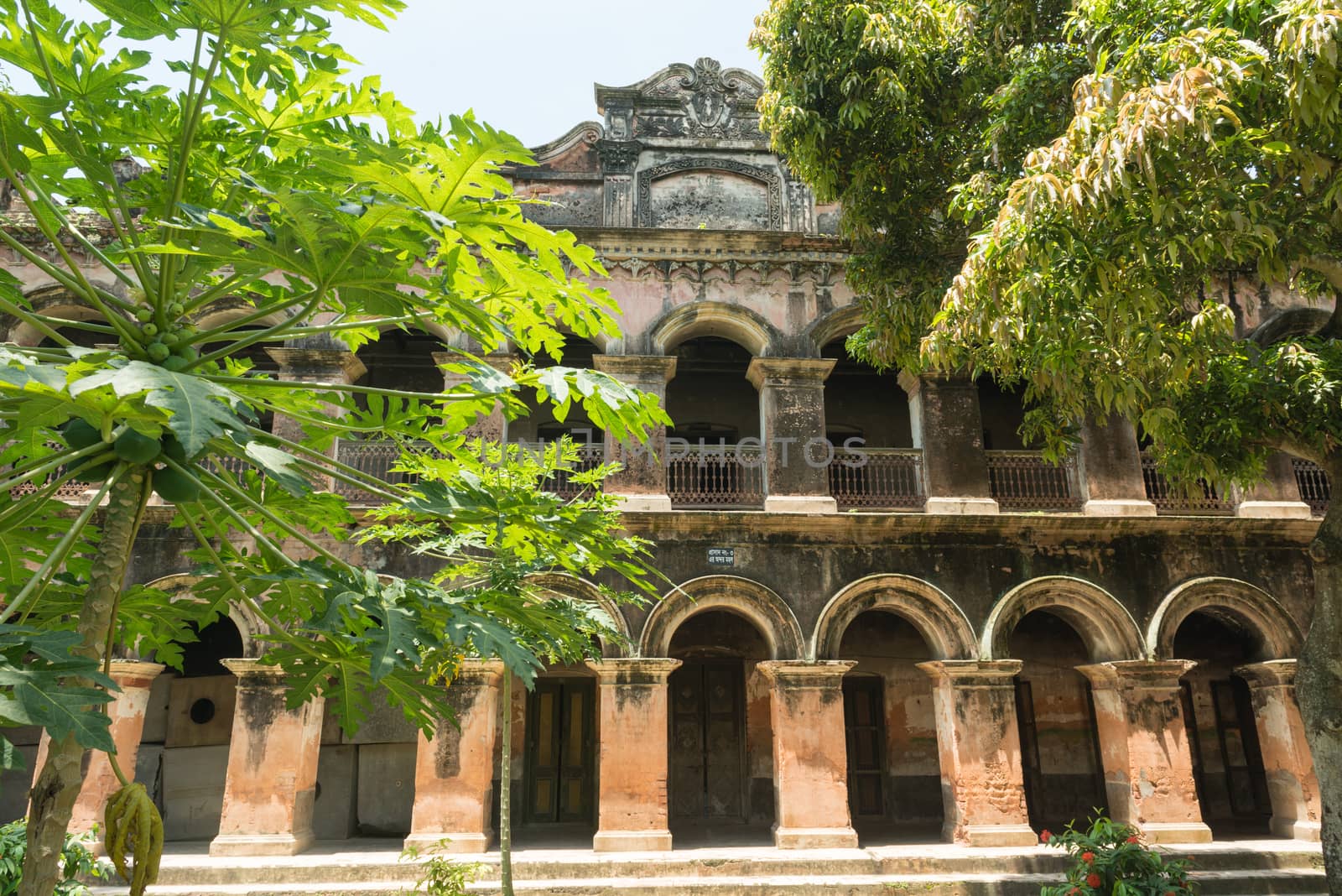 Manikgonj, Bangladesh - August 8: The great Baliati Zomidar Bari is located at the Saturia Upozila of Manikganj district. Name of the village is Baliati. This building is about 200 years of old. Gobinda Ram Shaha was the settler of the Zomidari at Baliati. He was a salt merchant. His forefather was poor and started small business. Later he owned that from his parent. Then he extended that business further and established Zomidari.
Photo taken on: August 8, 2014