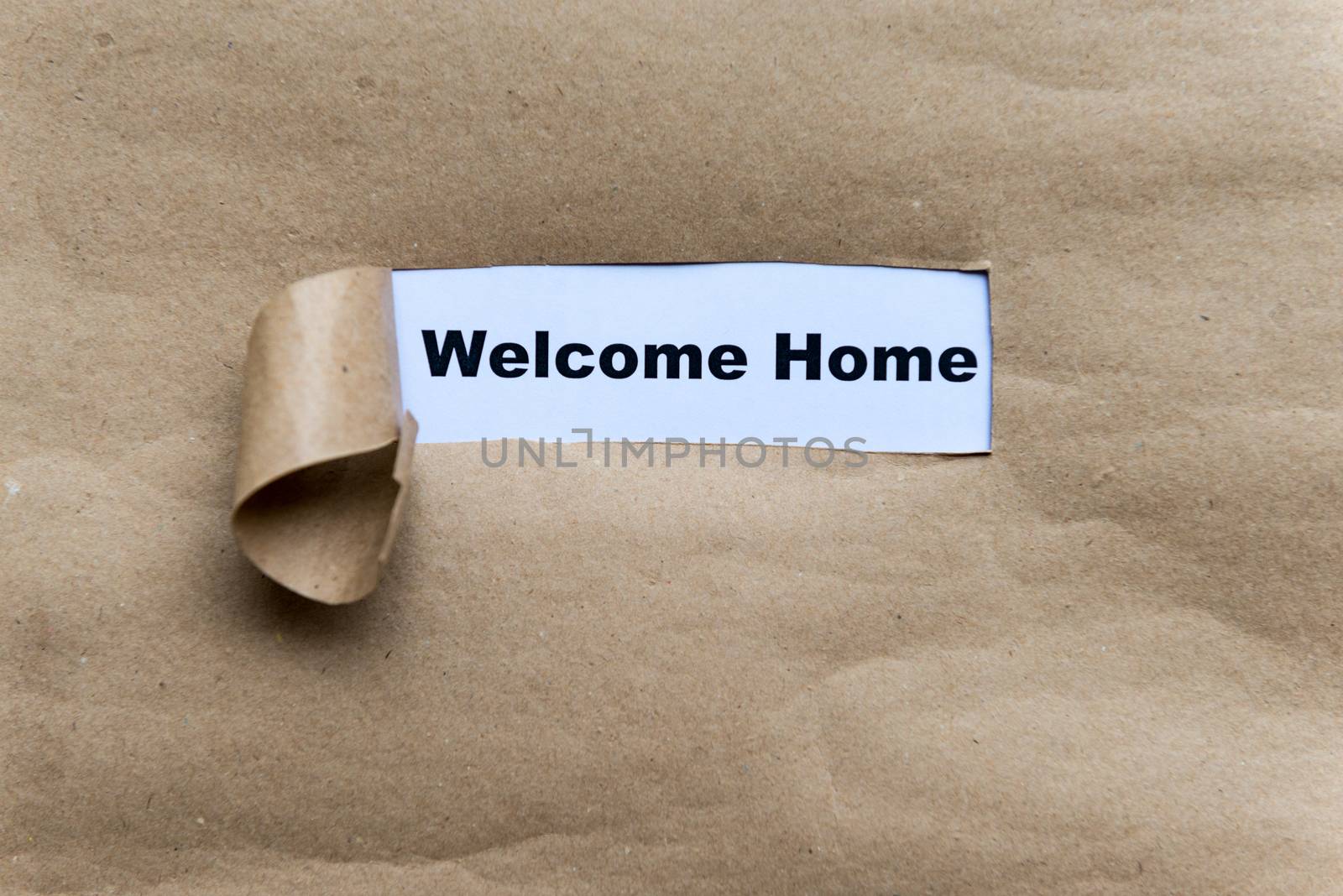 welcome home word in grey Torn Paper Concept