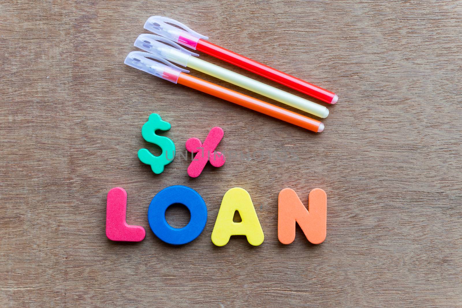 loan colorful word on the wooden background