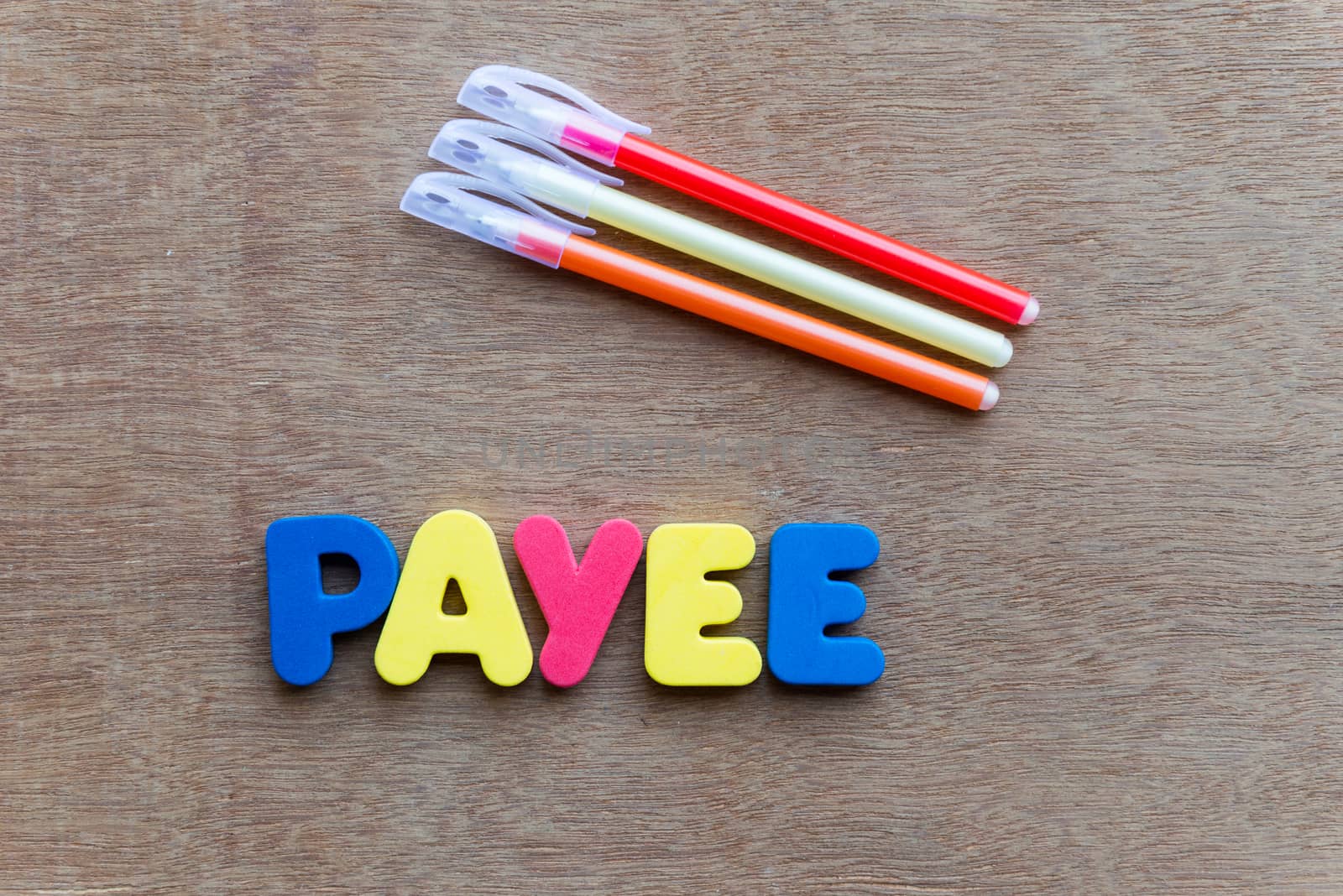payee colorful word on the wooden background