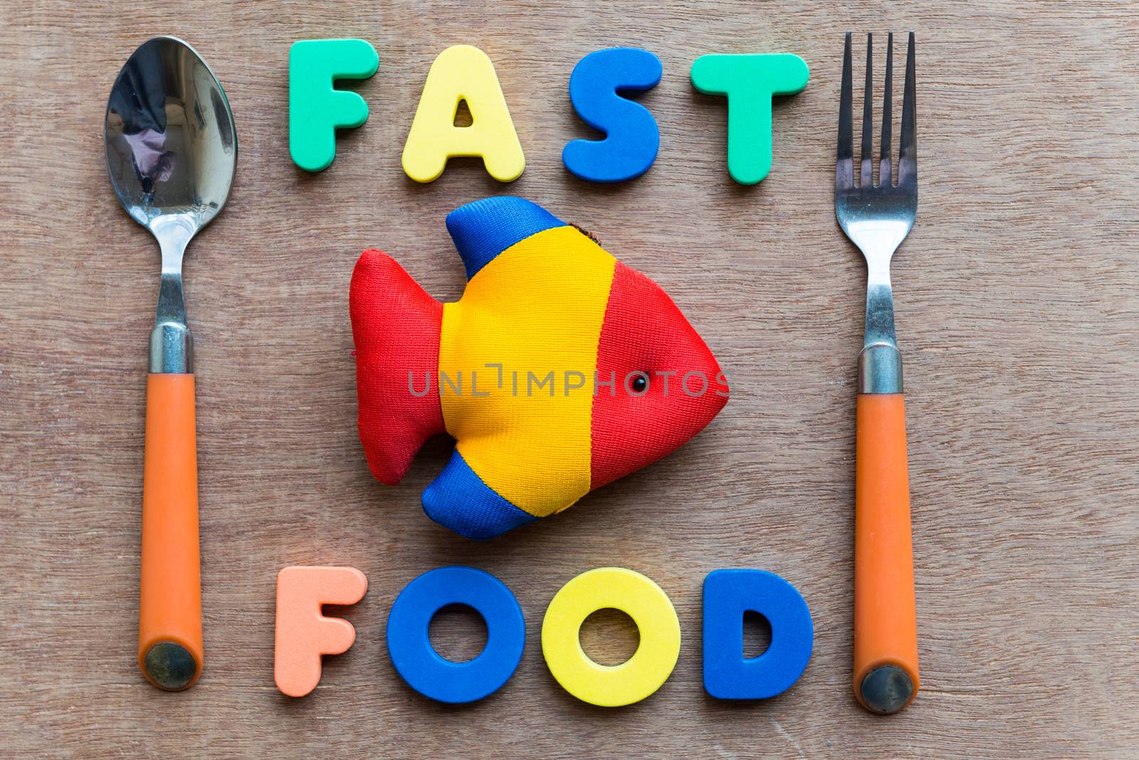 fast food colorful word on the wooden background