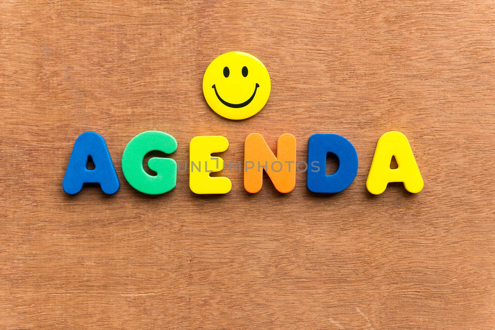 agenda colorful word on the wooden background