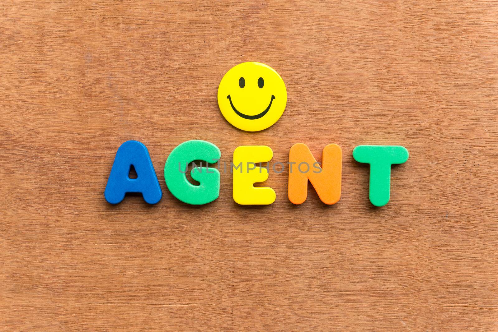 agent colorful word on the wooden background