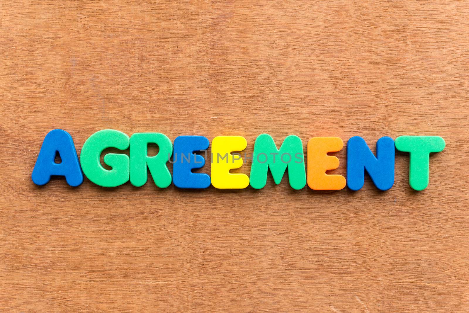 agreement colorful word on the wooden background