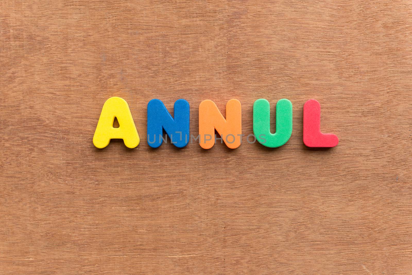 annul colorful word on the wooden background