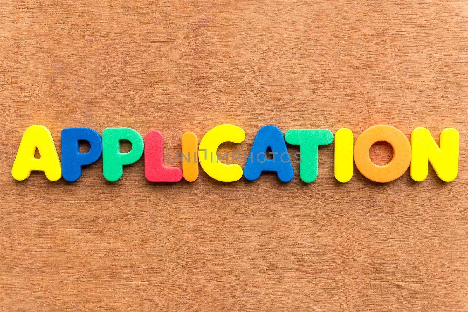 application colorful word on the wooden background