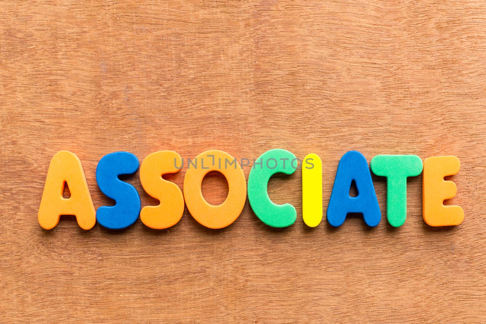 associate colorful word on the wooden background