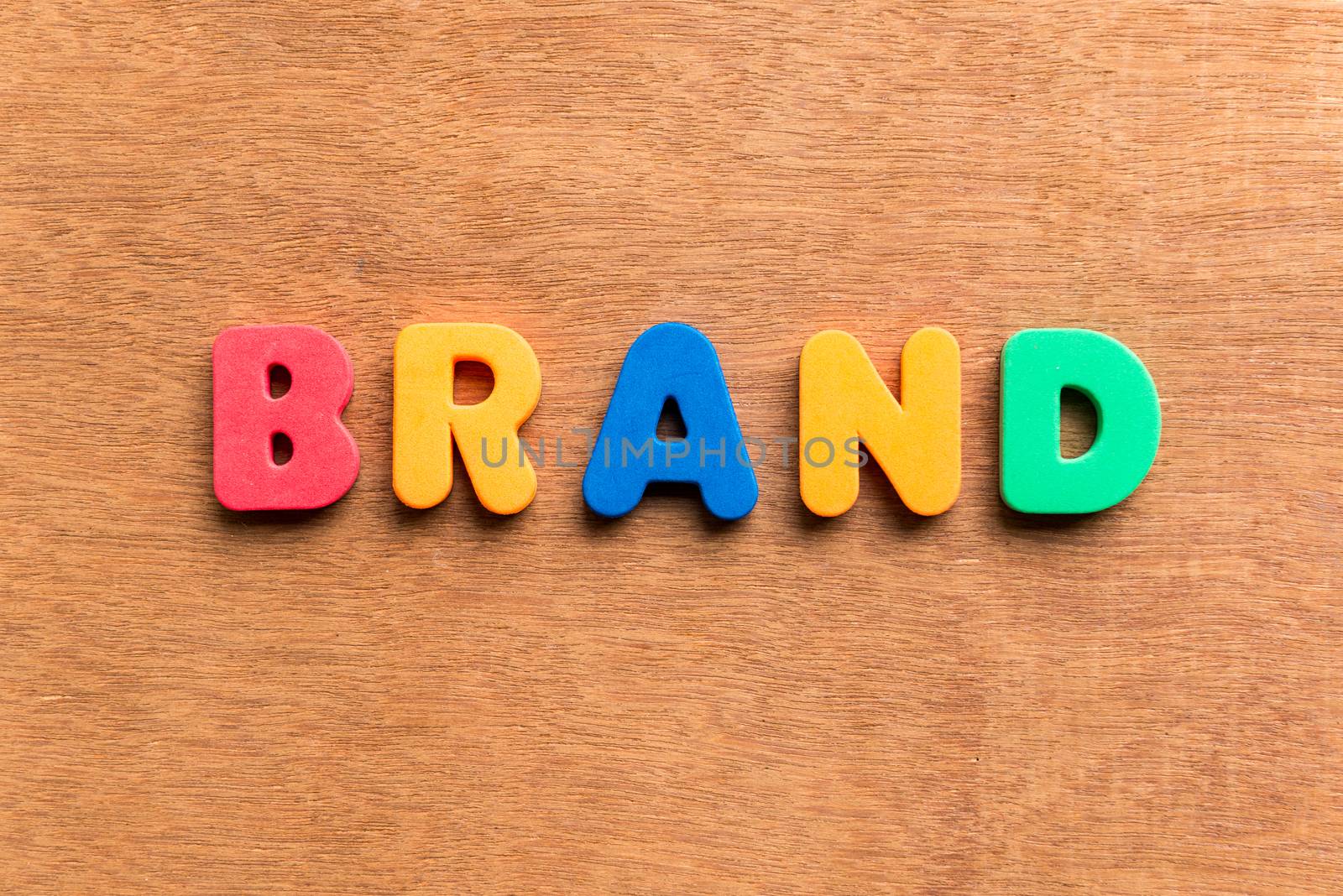 brand colorful word on the wooden background
