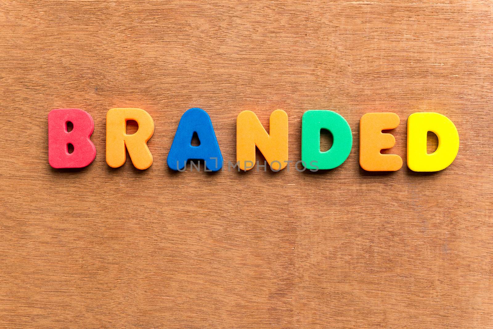 branded colorful word on the wooden background