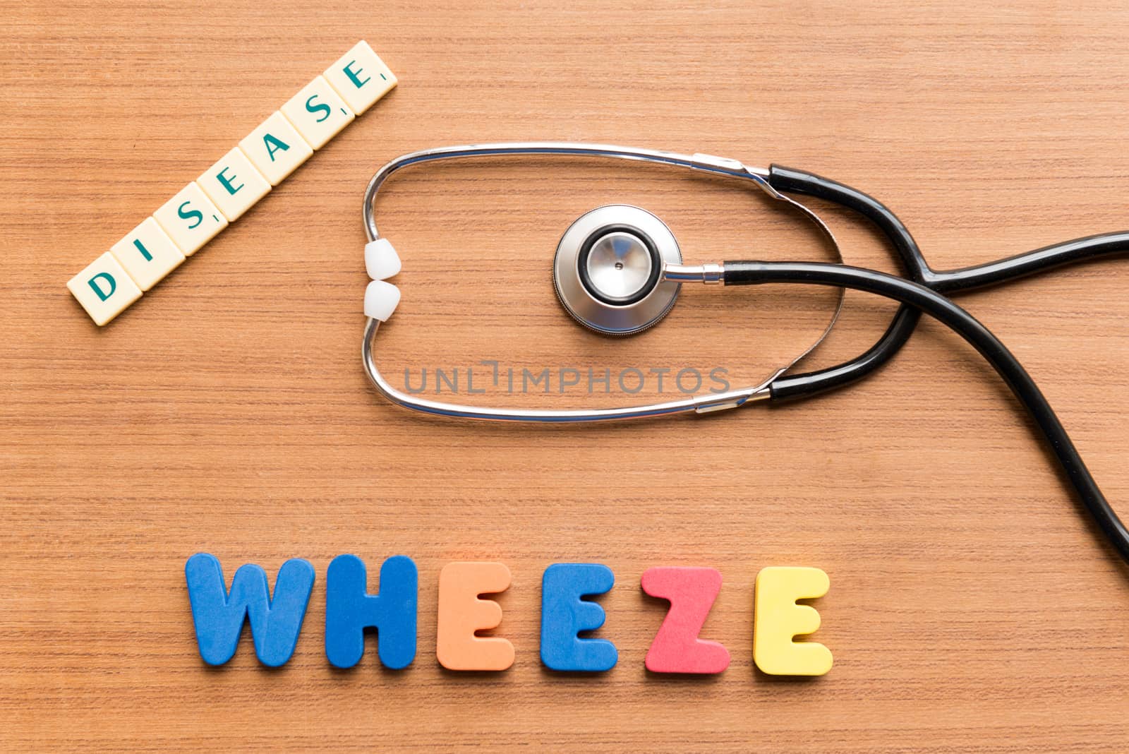 wheeze word on the wooden background