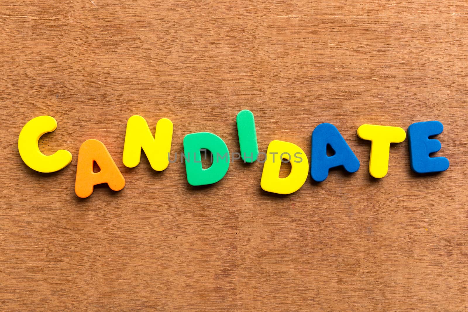 candidate colorful word on the wooden background