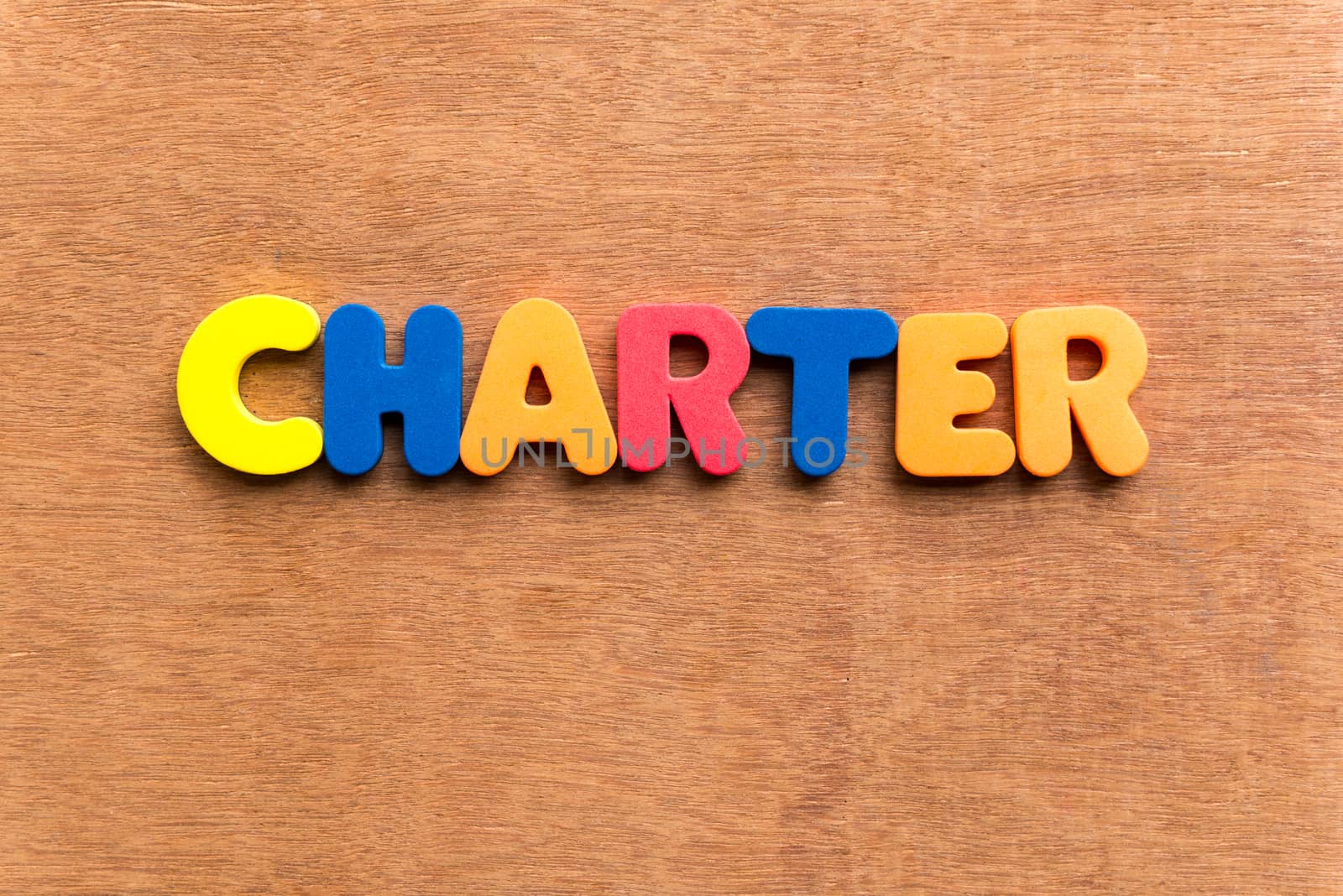 charter colorful word on the wooden background