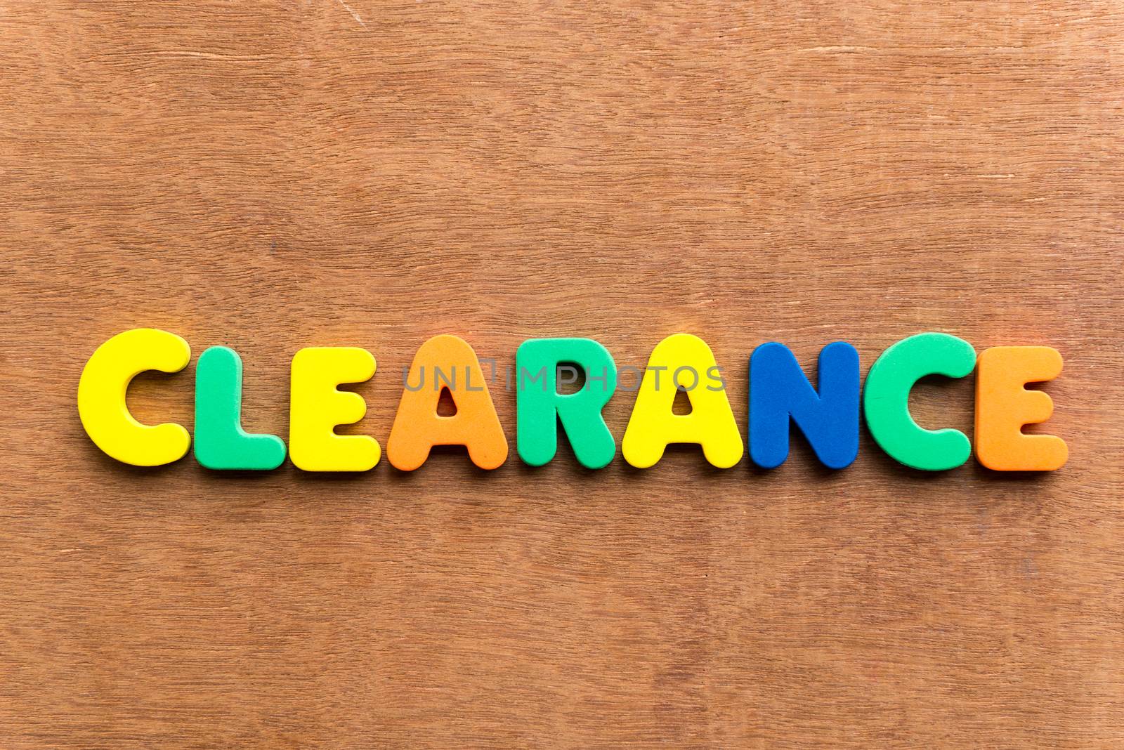 clearance colorful word on the wooden background