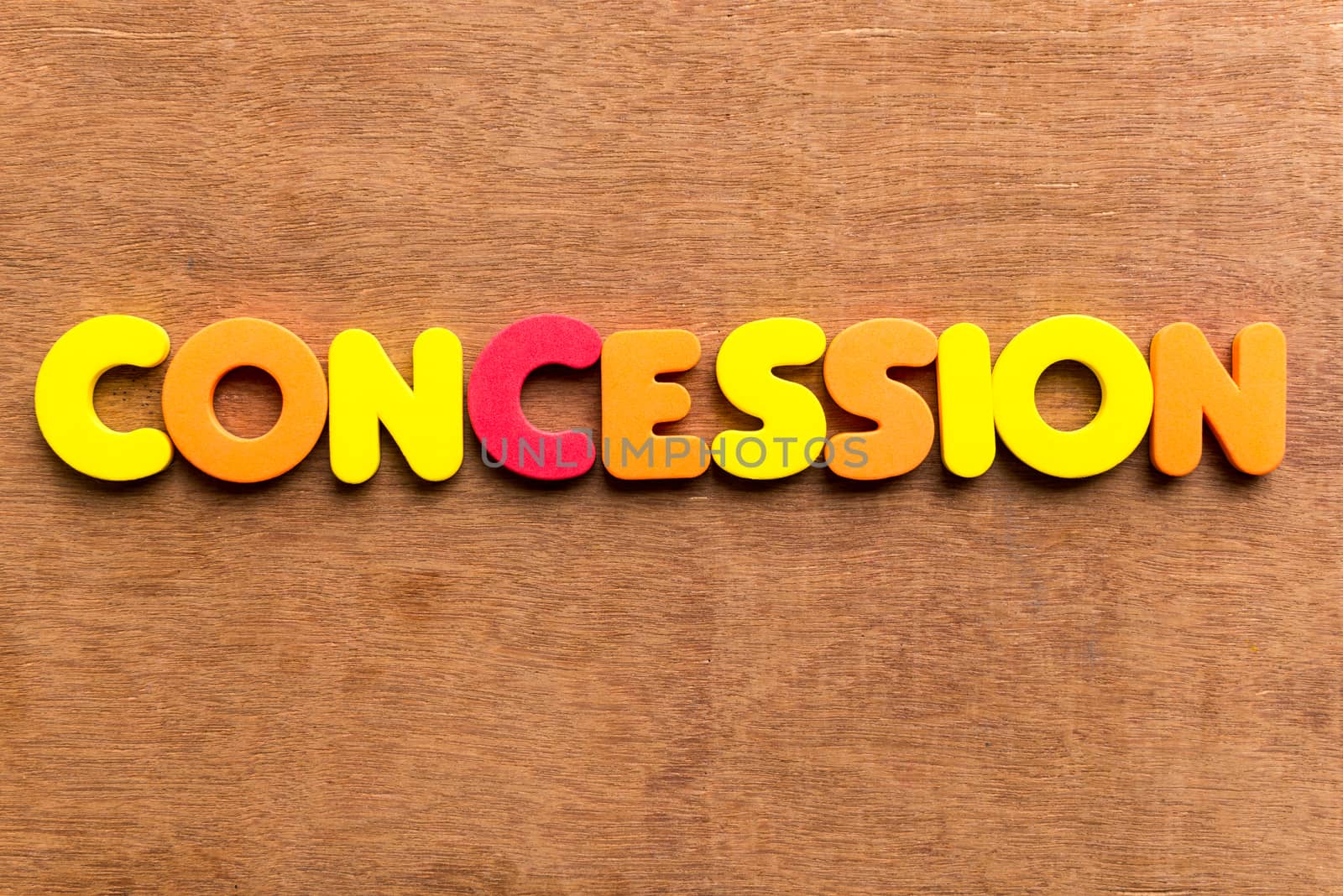 concession colorful word on the wooden background