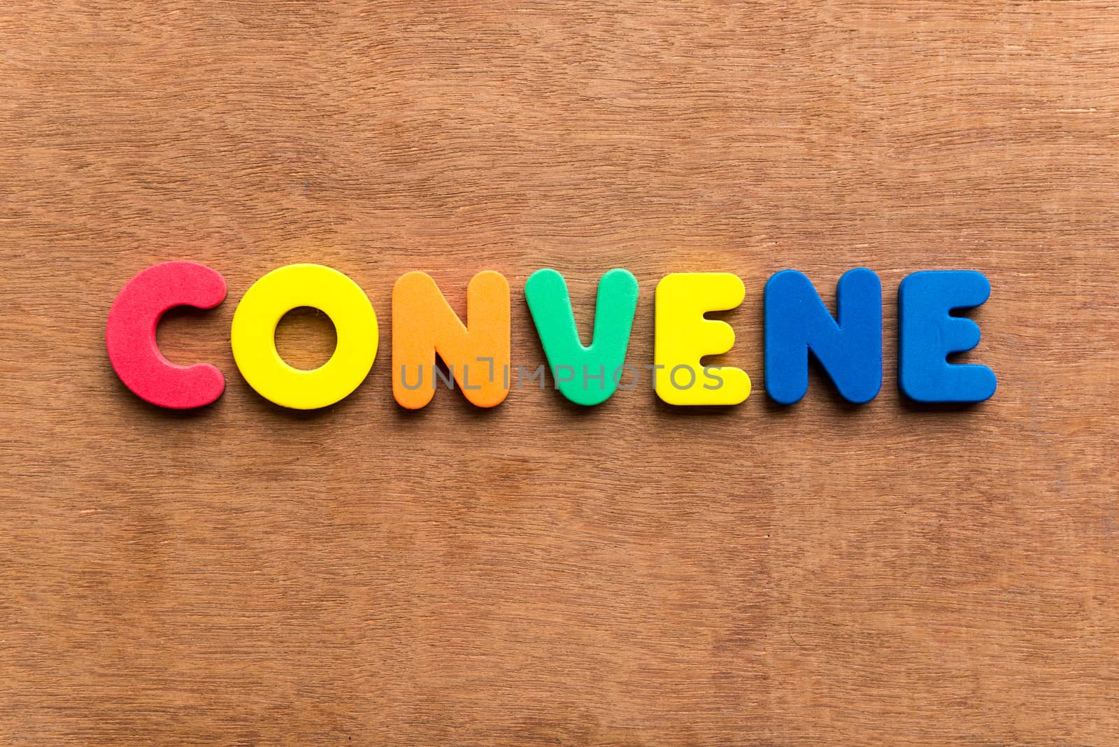 convene colorful word on the wooden background