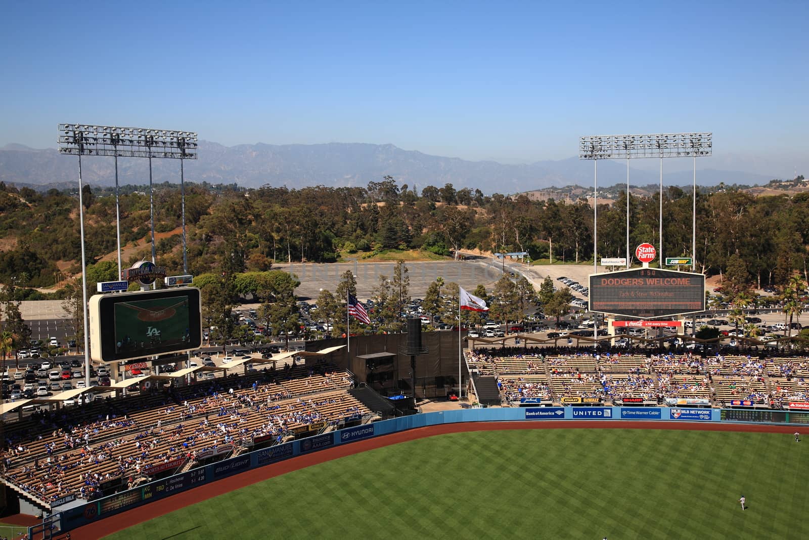 Scoreboards and bleachers at a Dodgers baseball game at Dodger Stadium in Los Angeles.
