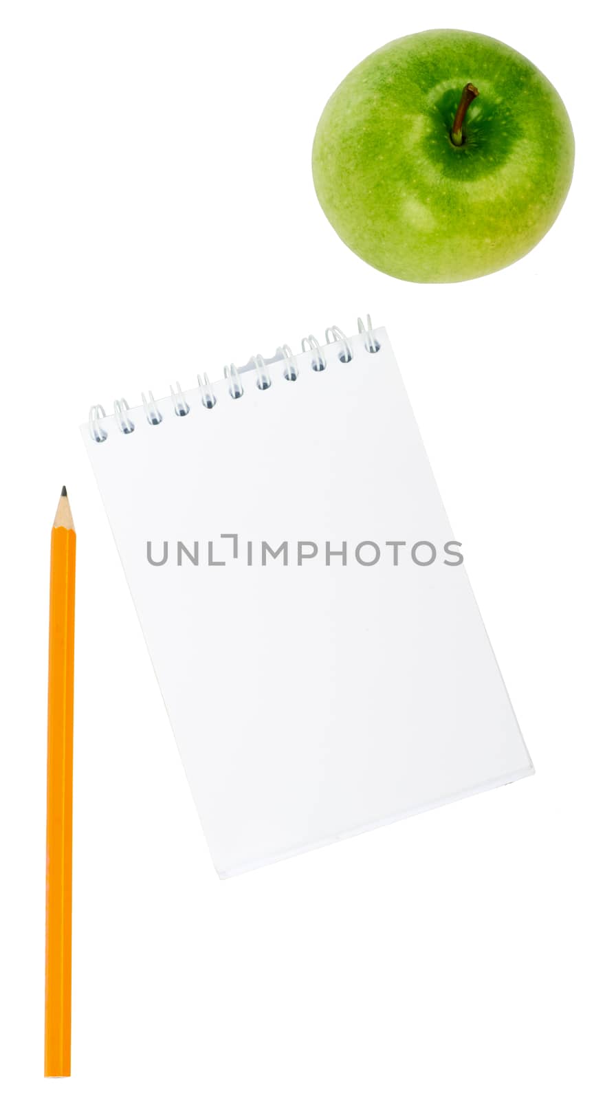 Apple, pencil and notebook on white background by cherezoff