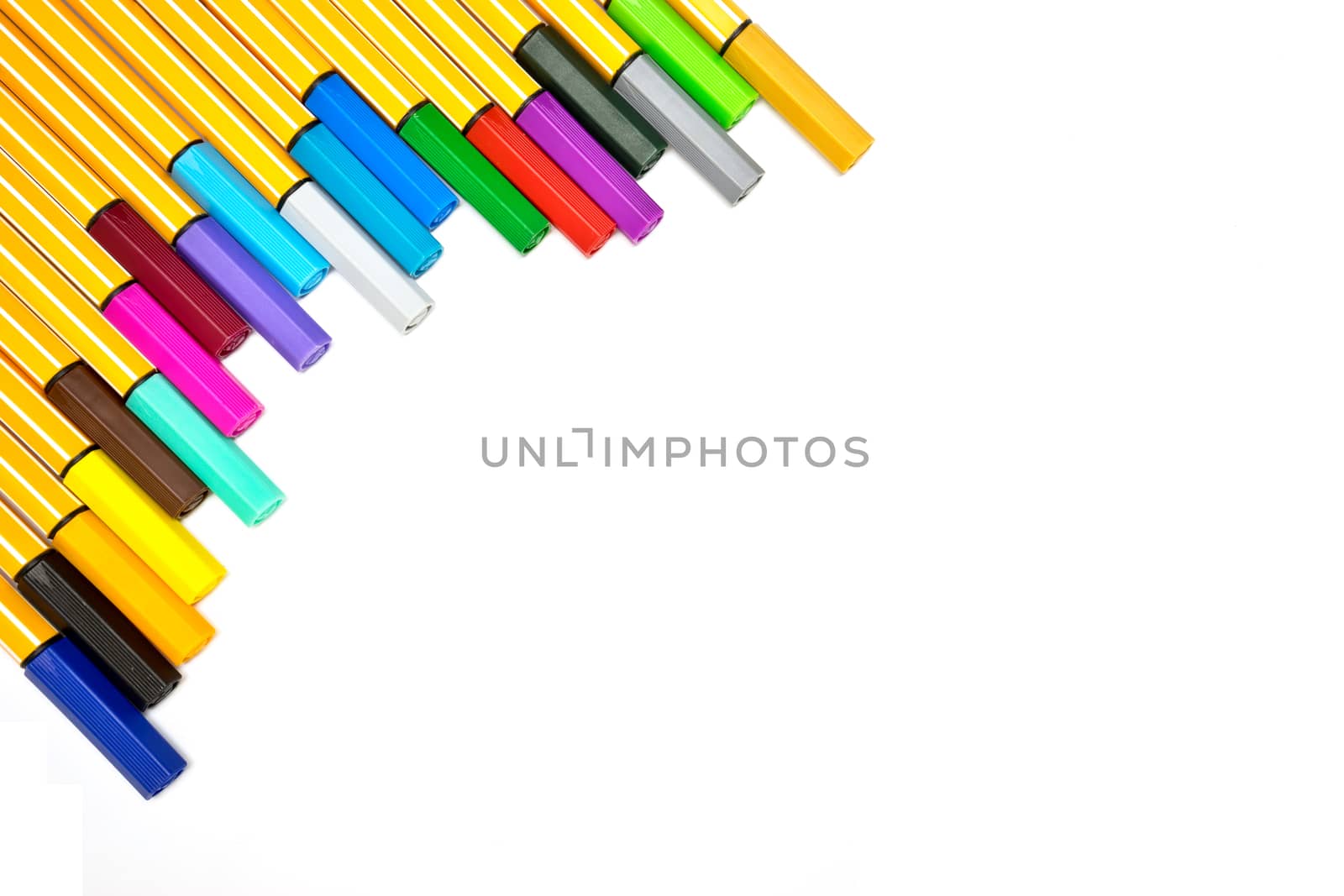 Colorful pens on isolated white background