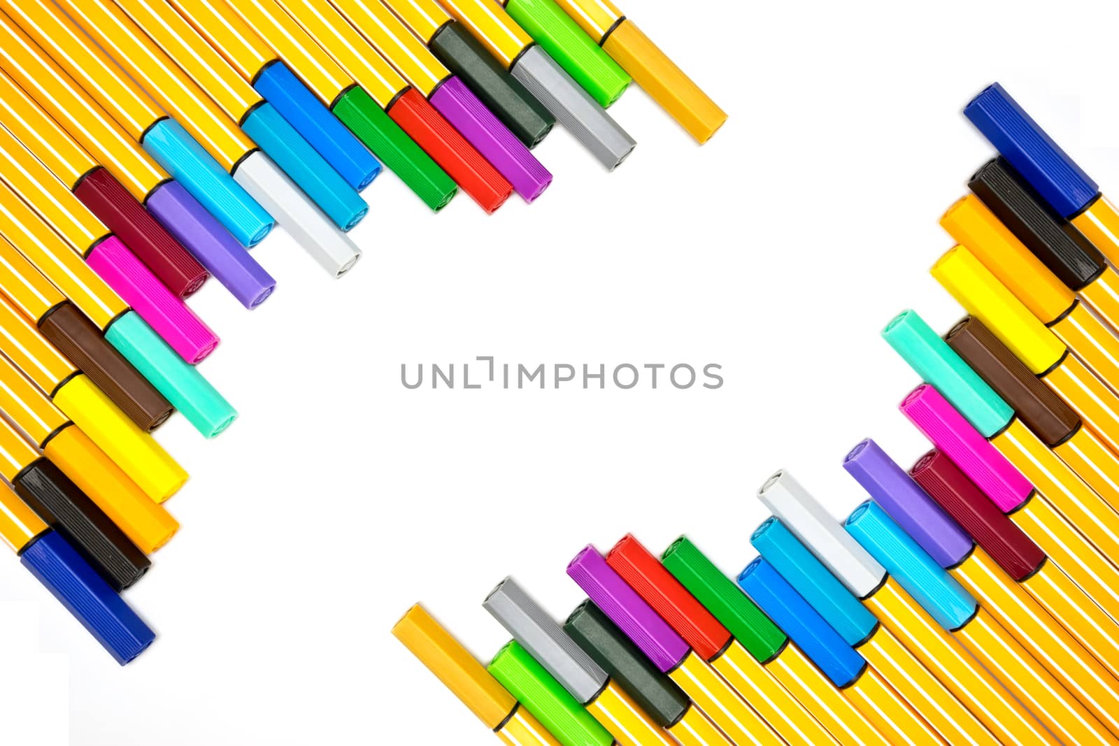 Colorful pens on isolated white background