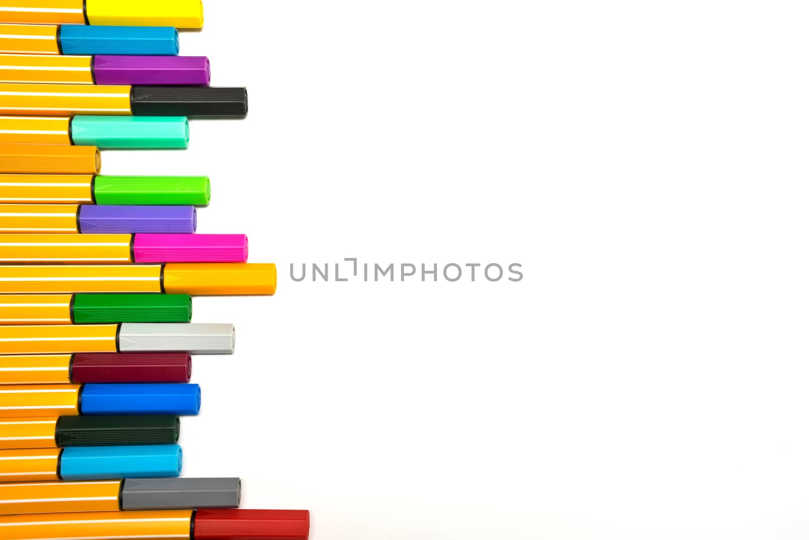 Colorful pens on isolated white background