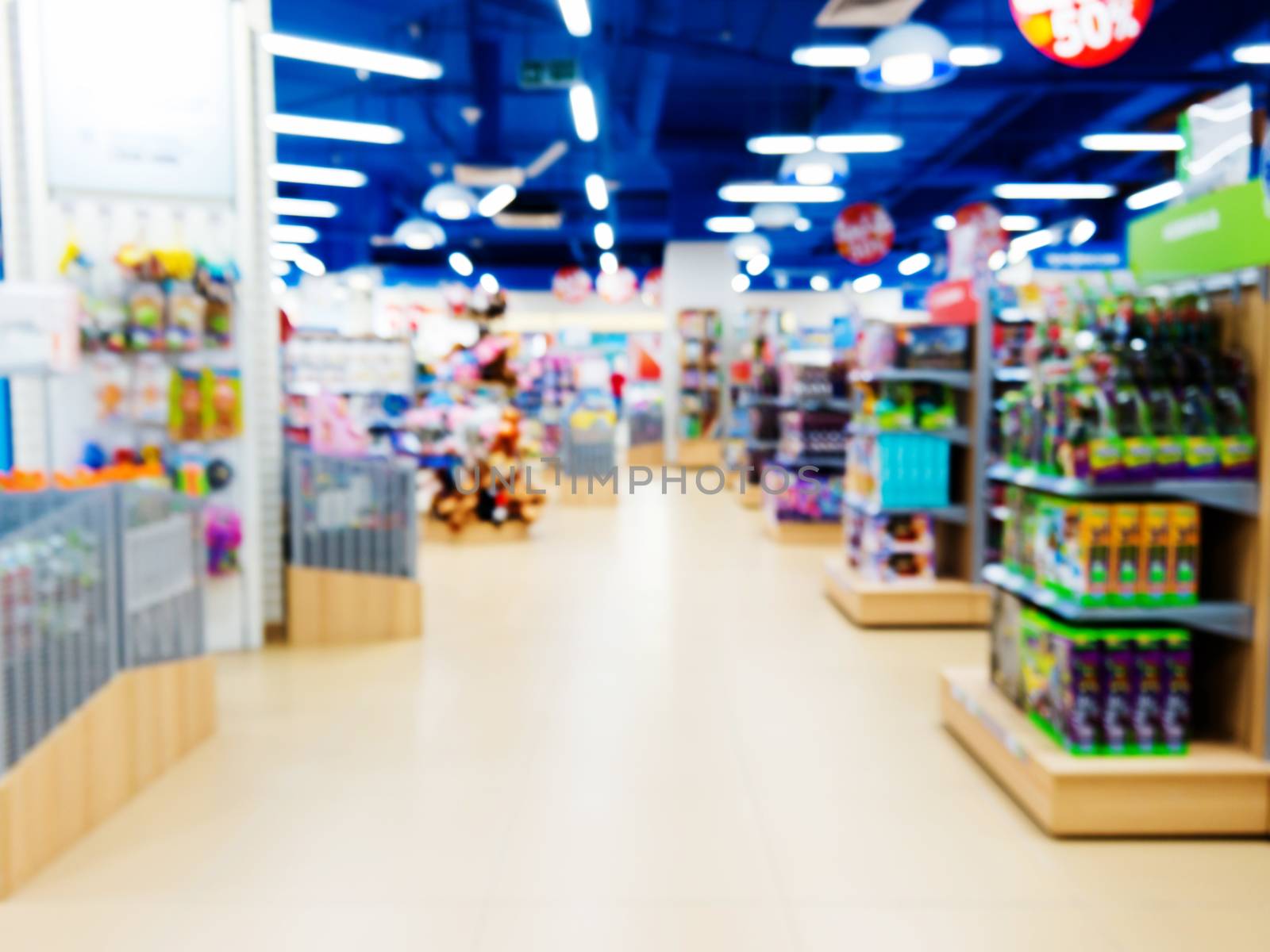 Blurred of kids toy store background by fascinadora